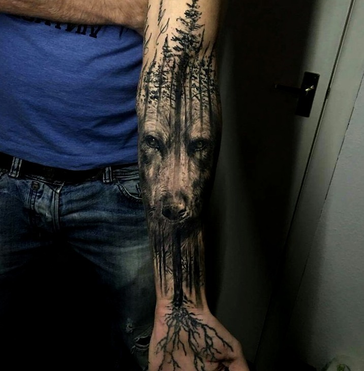 Tattoos of wolves in forests