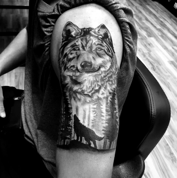 Tattoos of wolves in forests